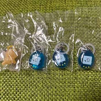 Amazon | たまごっち めじるしアクセサリー2種 | ハンドヘルド
